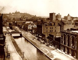 Cincinnati's Over-the-Rhine neighborhood in the late 1800s. The neighborhood was located north of the Miami-Erie canal route, now Central Parkway, and was home to hundreds of German immigrants. "The Rhine" was a local joking reference to the Miami Erie Canal since so many Germans lived on the other side of it.