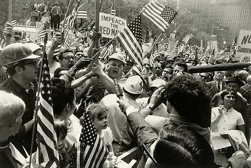 Confrontation between "hard hats"--American construction workers--and protesters during the 1960s. 